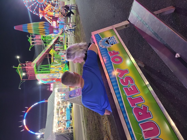 Enjoying the midway at the Lee Regional Fair