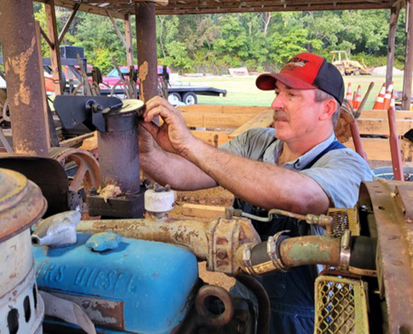 Image of volunteers helping at previous fairs