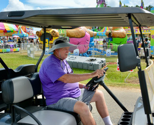 Image of Volunteers helping at previous Fairs