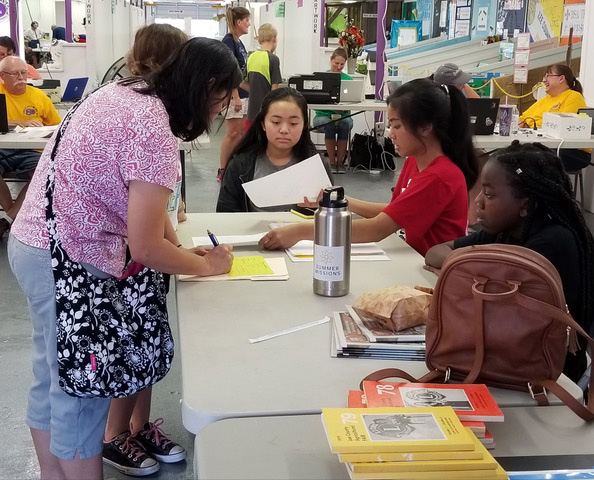 Image of Volunteers helping at previous Fairs